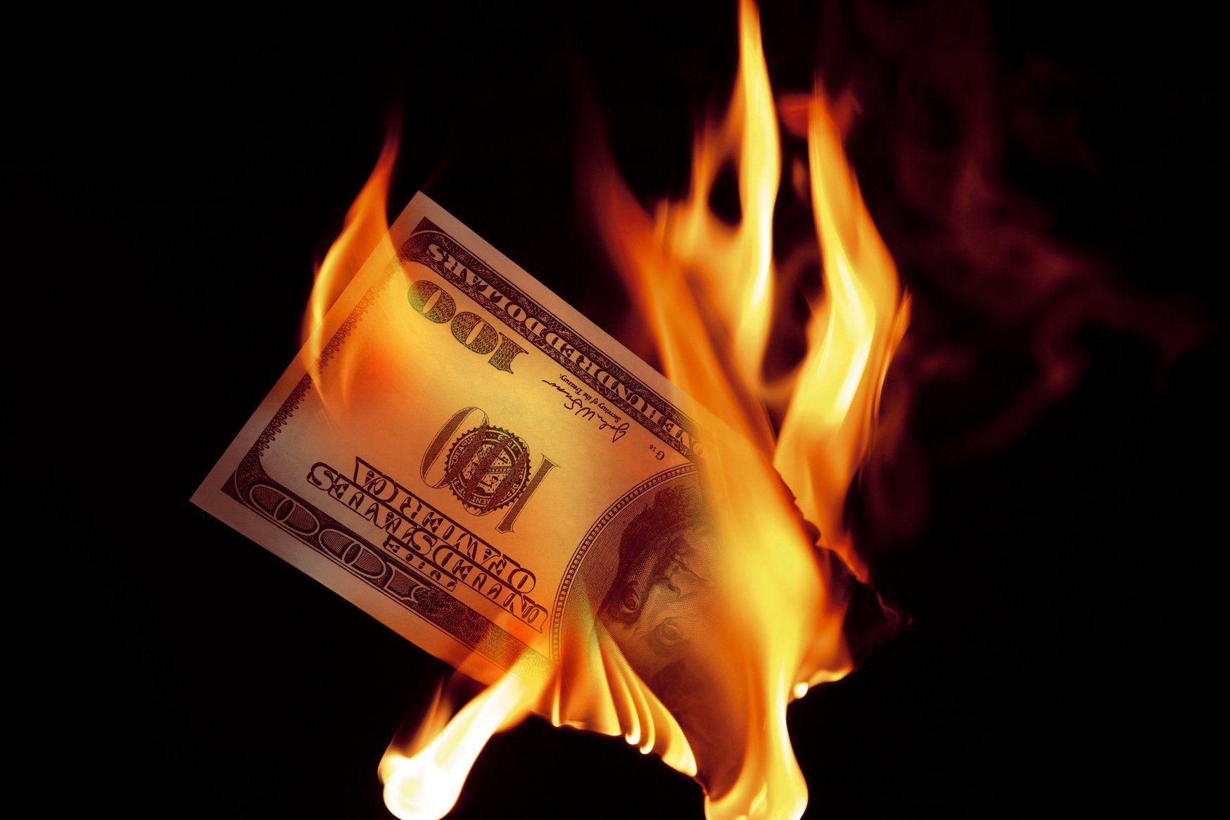 burning dollars